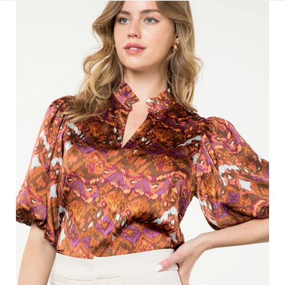 THML  
Nwt 
  
Abstract Blouse In Rust/Pink
Xsmall. - Picture 13 of 13